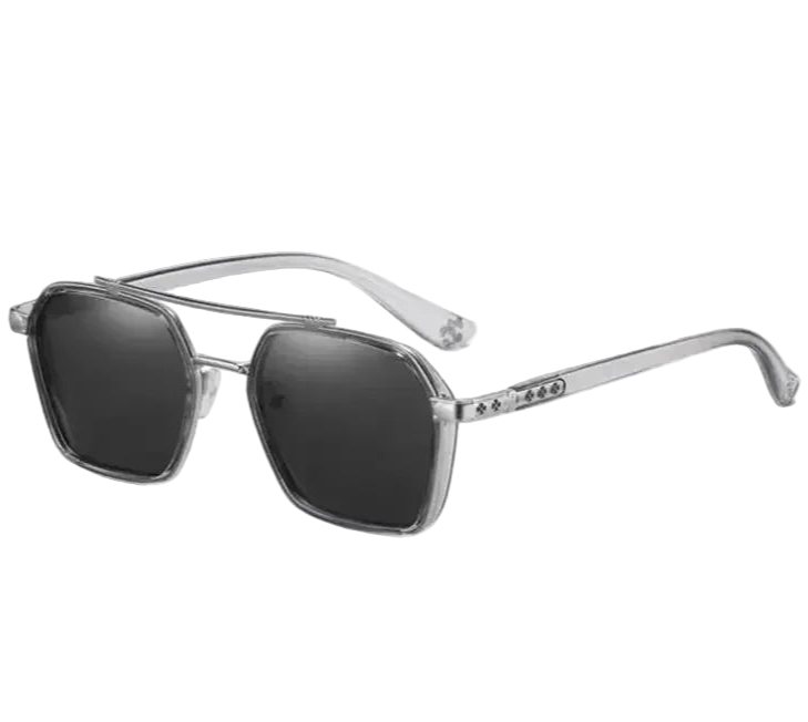 Sunglasses with silver frame and dark lenses on a white background